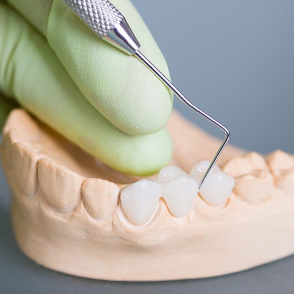 Dental tool and model of lower jaw